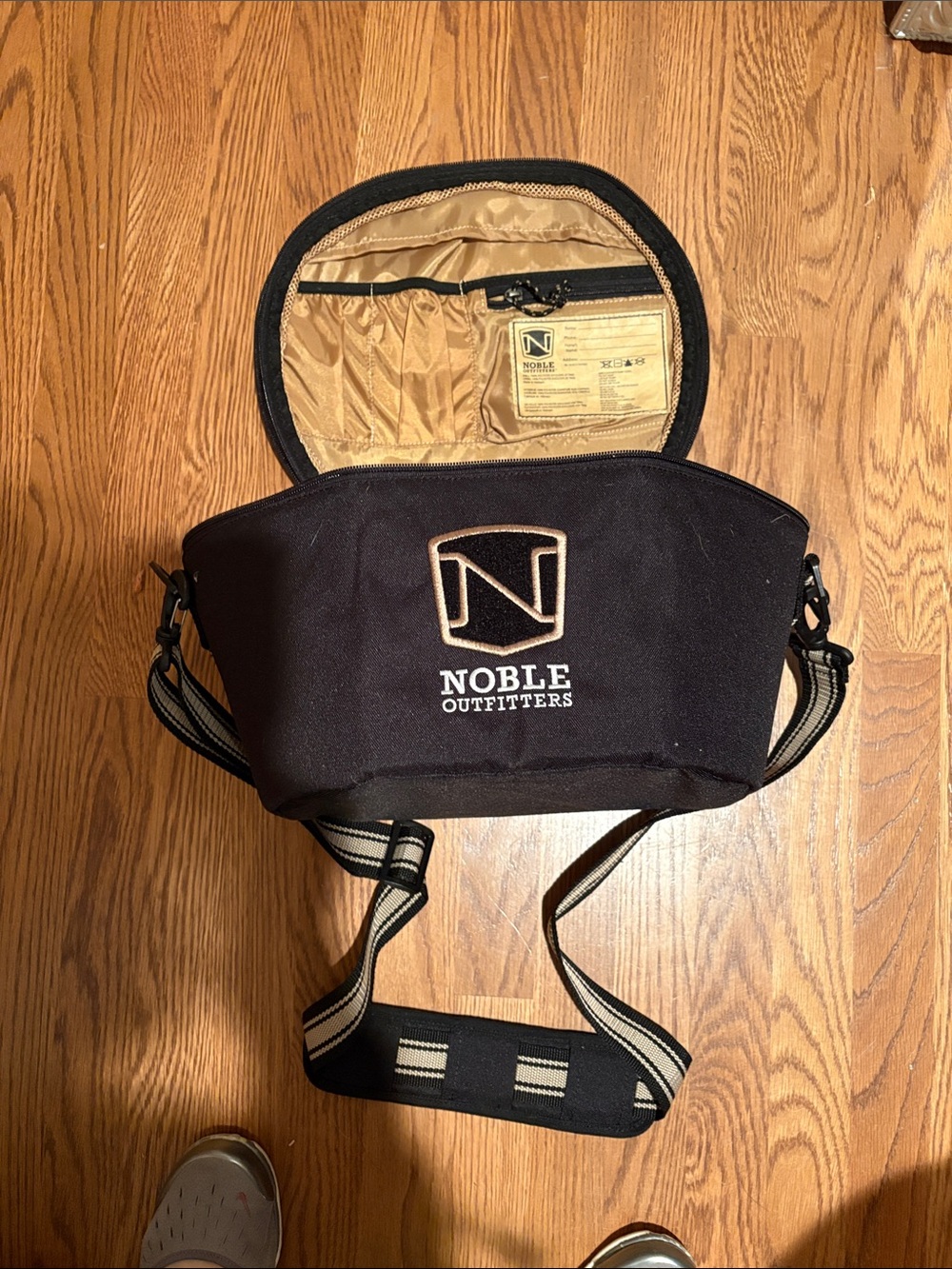 Black hard sided riding helmet bag